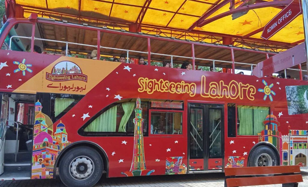 Roofless double-decker sightseeing bus for historical tourist attractions in Lahore